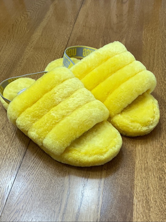 UGG Shoes - Woman’s UGG Fluff Yeah yellow slides. Size 5. Sheepskin. Elastic strap. Like new